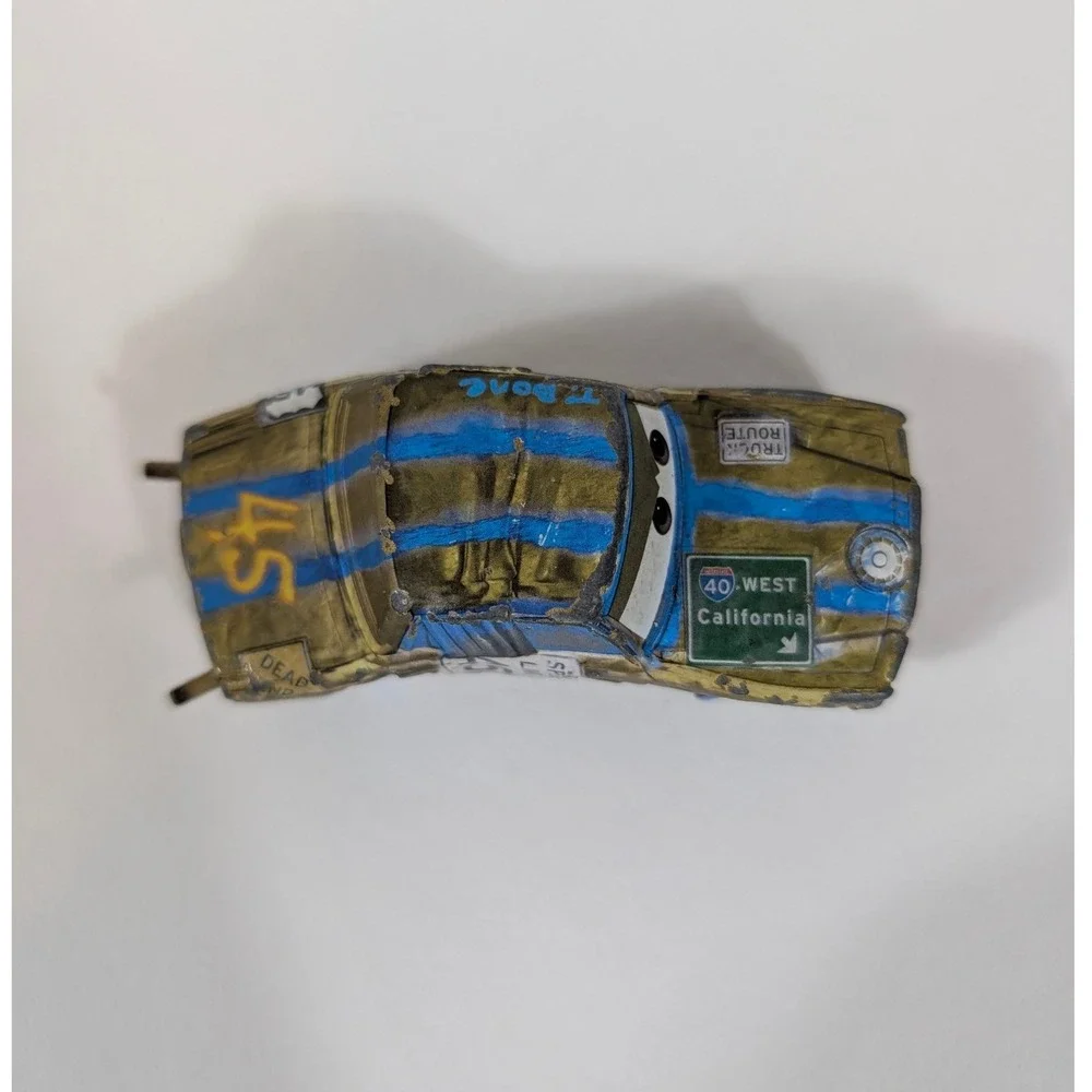 Disney Pixar Cars Mattel T-Bone Demolition Derby Diecast Vehicle 45 Gold Blue